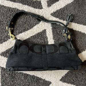 Coach mini purse- has had a lot of love